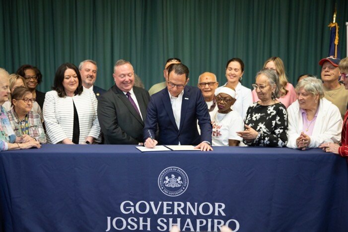 Gov. Josh Shapiro in Scranton signs executive order directing the PA Department of Aging to develop a 10-year plan.